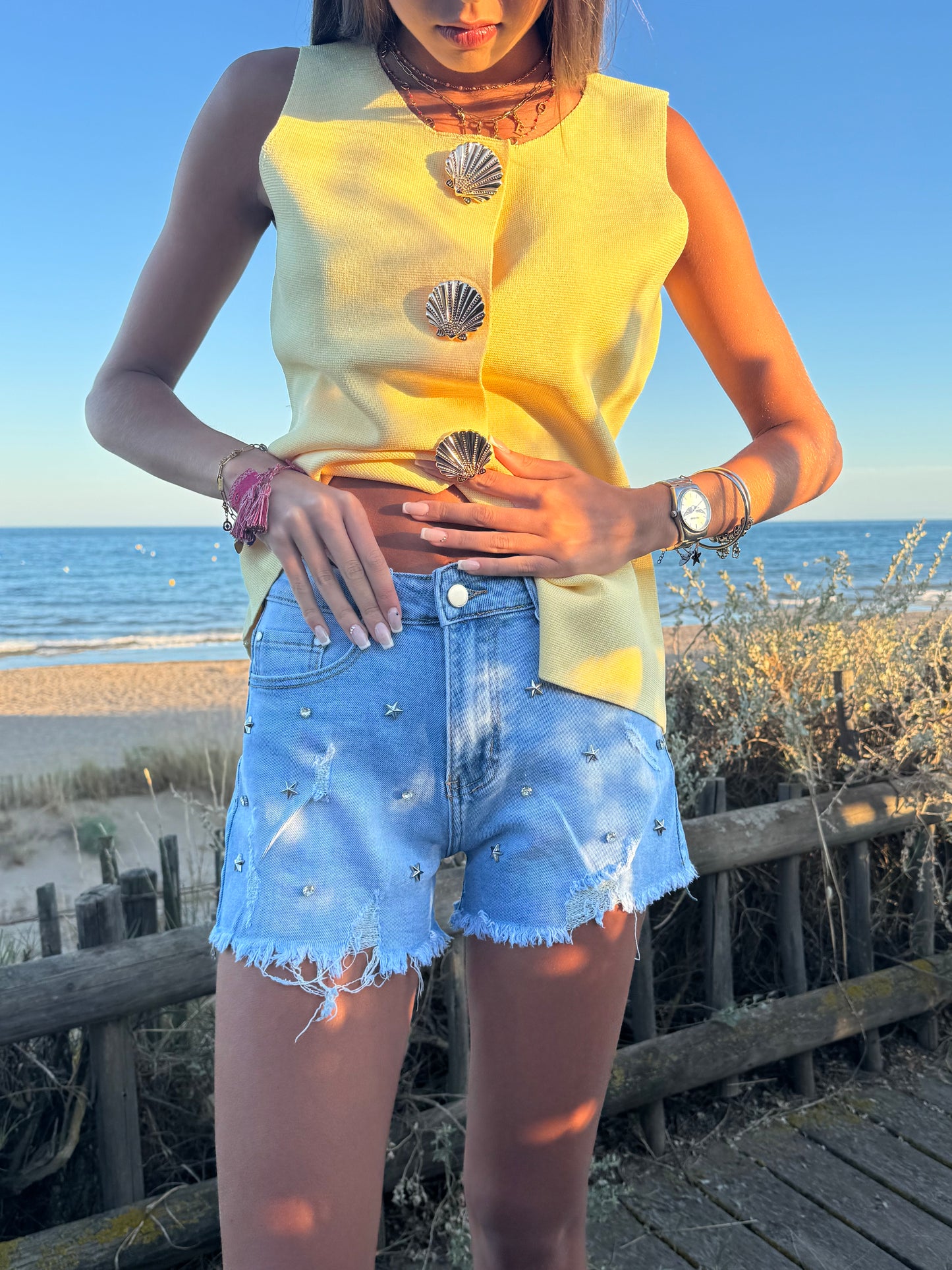 Short en jean perlé